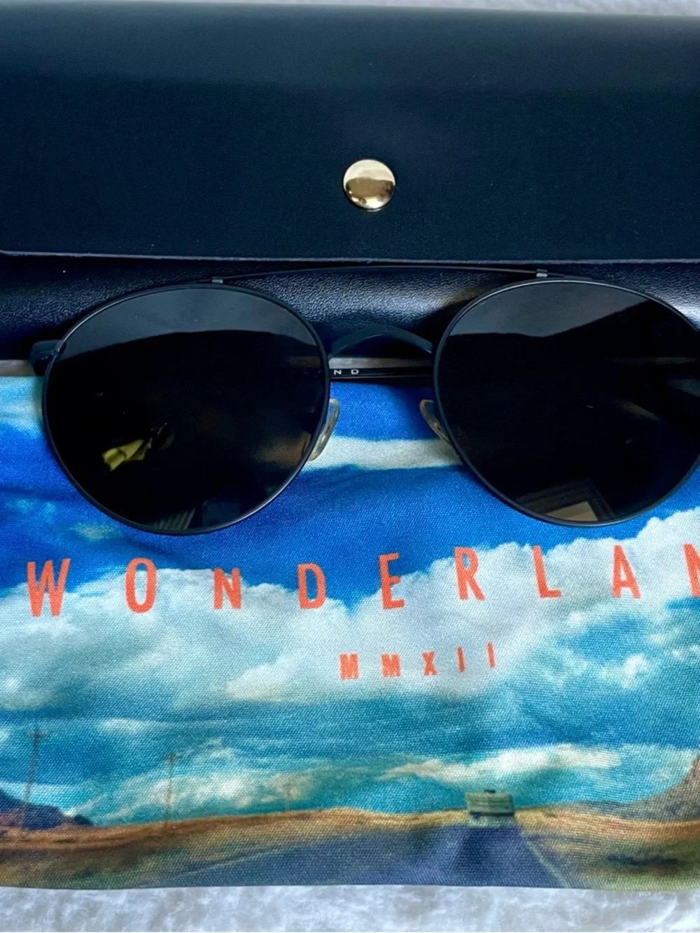 WONDERLAND INDIO Round Metal Frame Sunglasses in Black with Brown Lenses